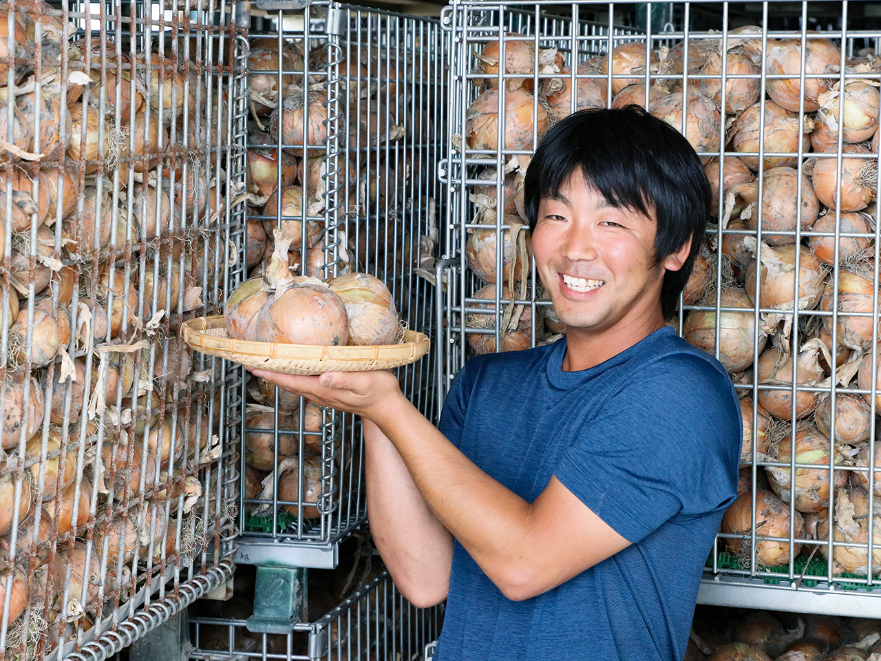 自慢のタマネギをPRする竹林さん